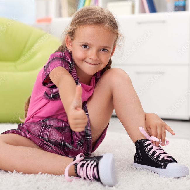 smiling girl with new shoes